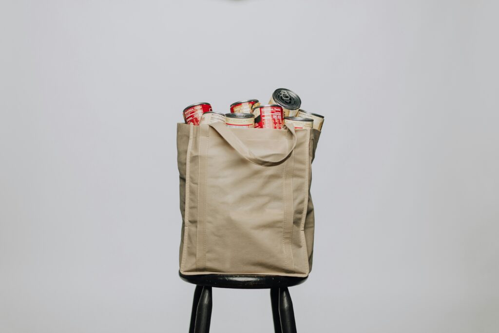 Non woven Carry Bags in panipat by Hanu Packaging eco Friendly shooping bag field with groceries including cans and bottles